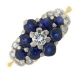 An 18ct gold diamond and blue gem dress ring.