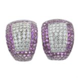 A pair of pavé-set pink sapphire and diamond and earrings.