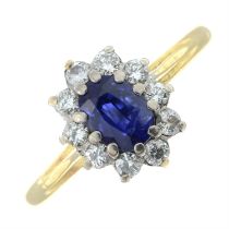 An 18ct gold sapphire and diamond cluster ring, by Mappin & Webb.