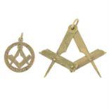 Two 9ct gold masonic square and compass pendants.
