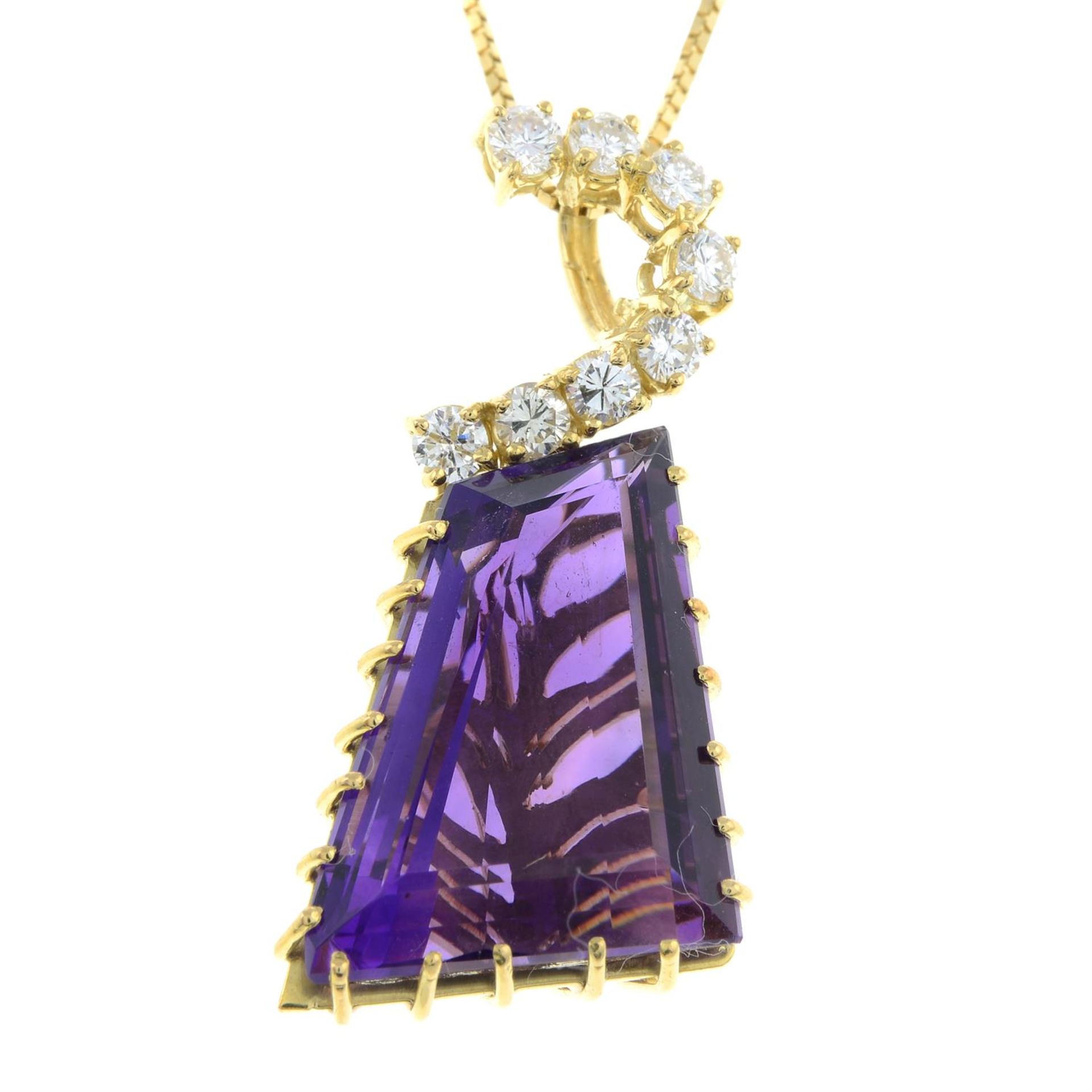 An amethyst and diamond pendant, with chain.