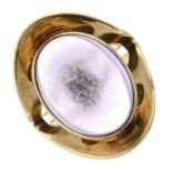 A mid 20th century amethyst cabochon cocktail ring.