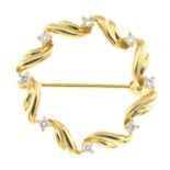 A 18ct gold diamond wreath brooch.