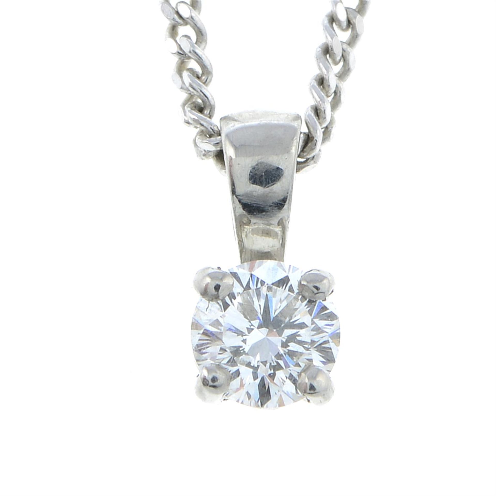A platinum brilliant-cut diamond single-stone pendant, with chain.
