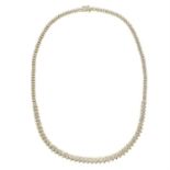 A 9ct gold single-cut diamond necklace.