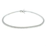 A brilliant-cut diamond line bracelet.