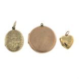 Three early 20th century Back and Front locket pendants.