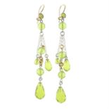 A pair of peridot briolette drop earrings.