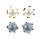 Two pairs of cultured pearl stud earrings.