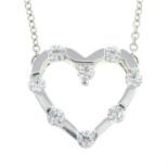 An 18ct gold brilliant-cut diamond openwork heart pendant, with integral chain.