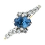 A 9ct gold blue topaz and diamond dress ring.