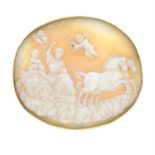 A late 19th century 9ct gold shell cameo brooch, depicting a horse drawn chariot procession,