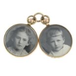 Two Edwardian 9ct gold photo locket pendants, suspended from a single jump ring.