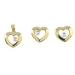 A 9ct gold heart-shape free-moving diamond pendant, together with a pair of matching earrings.