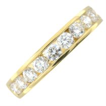 An 18ct gold brilliant-cut diamond half eternity ring.