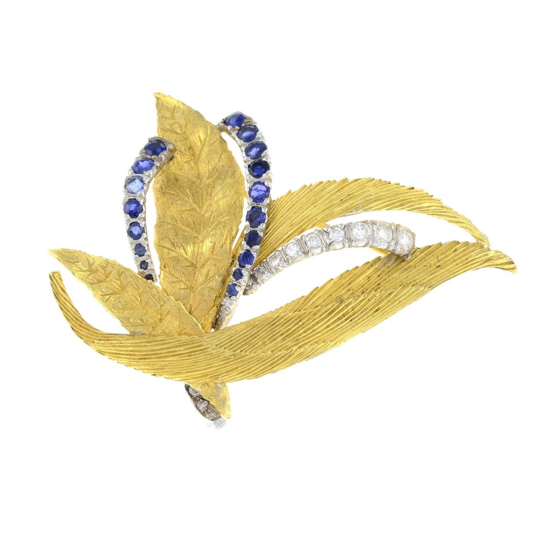 An 18ct gold brilliant-cut diamond and sapphire foliate brooch.