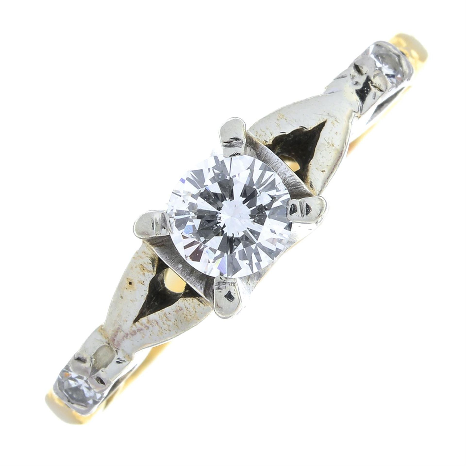 A brilliant-cut diamond single-stone ring, with single-cut diamond sides.