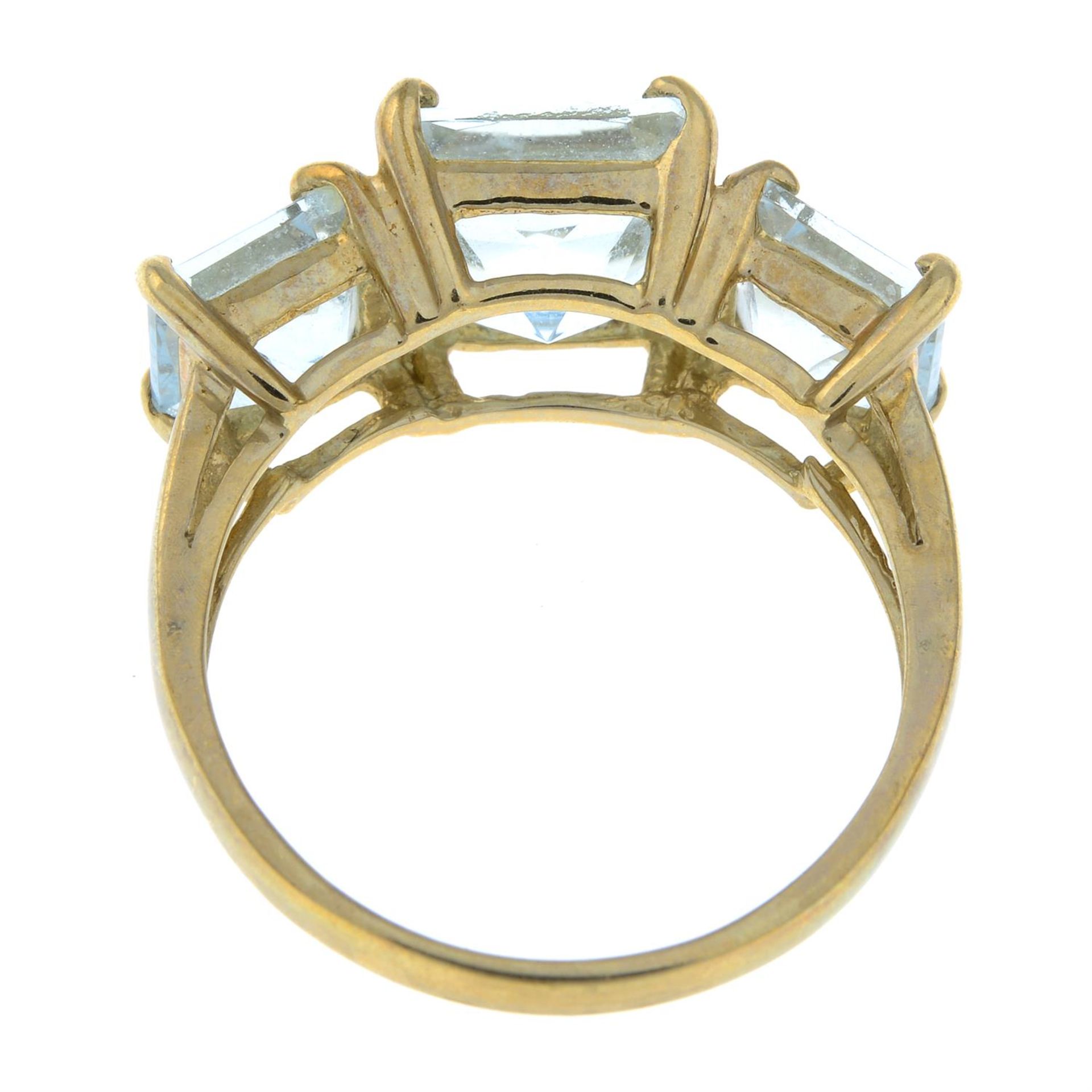 A 9ct gold aquamarine three-stone ring. - Image 2 of 2