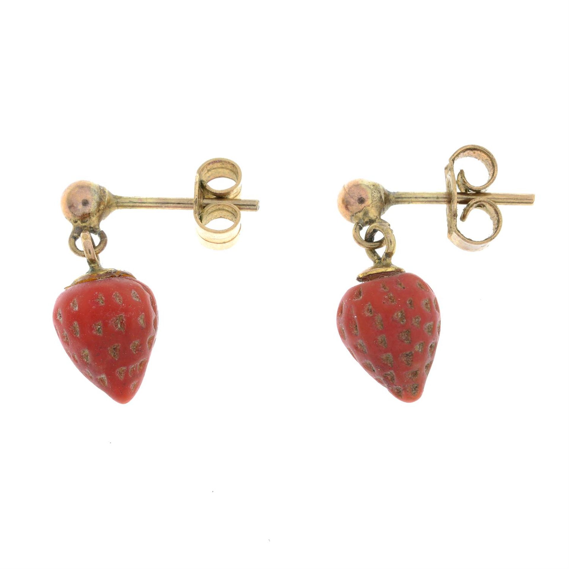 A pair of coral drop earrings, each carved to depict a strawberry. - Image 2 of 2