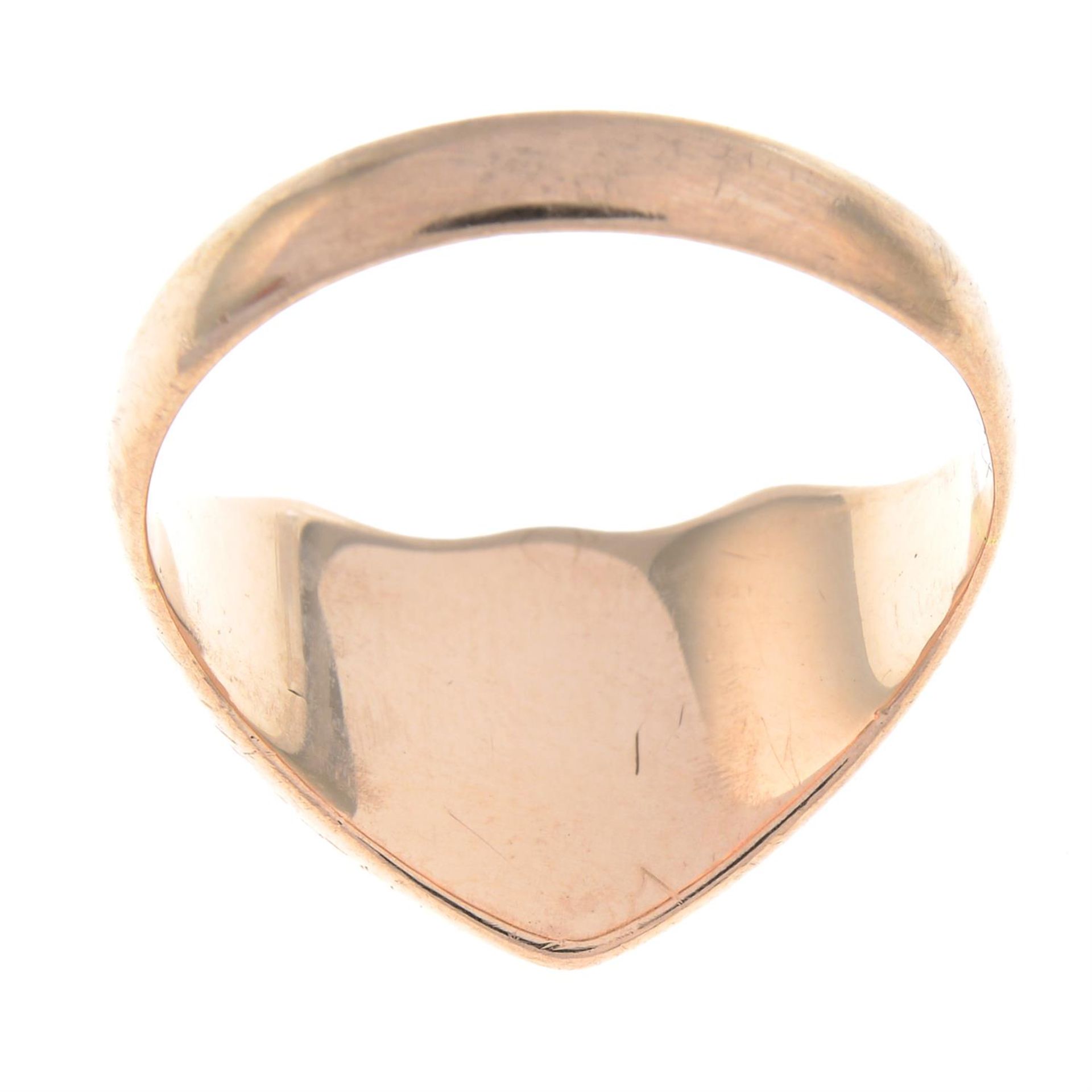 An early 20th century shield-shape signet ring, with scrolling sides. - Image 2 of 2