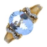 A 9ct gold aquamarine and diamond dress ring.