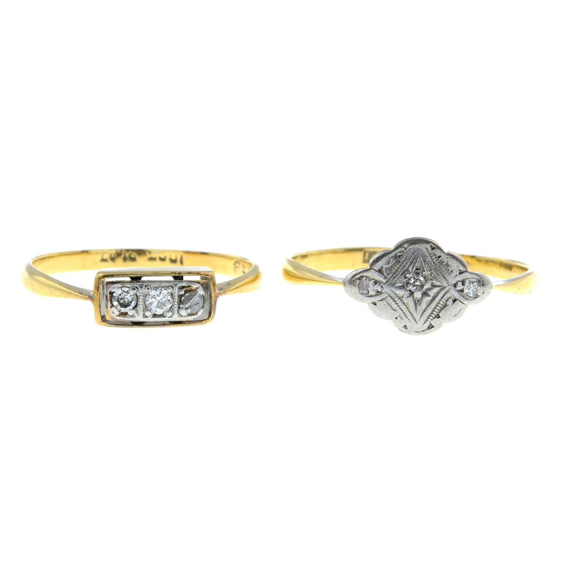 Two early 20th century 18ct gold and platinum diamond rings.
