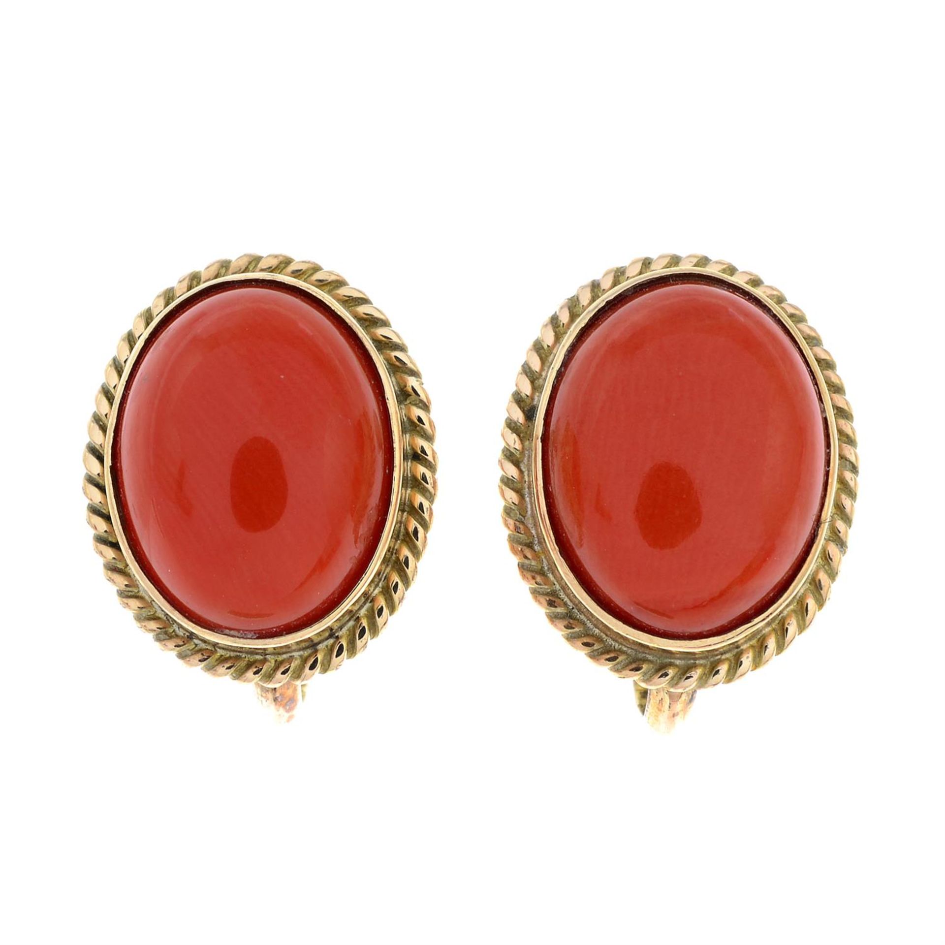 A pair of coral earrings.