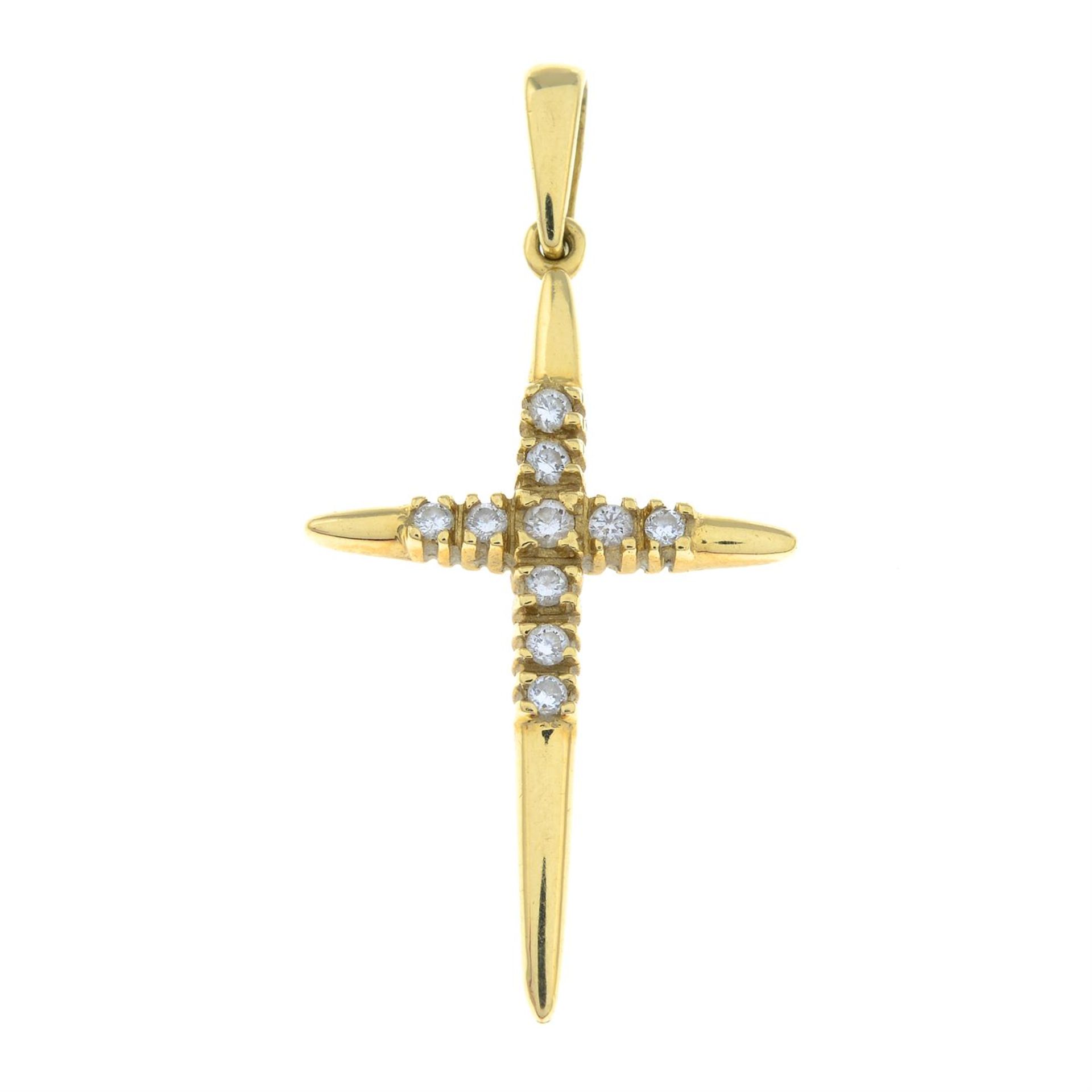 An 18ct gold diamond cross pendant.