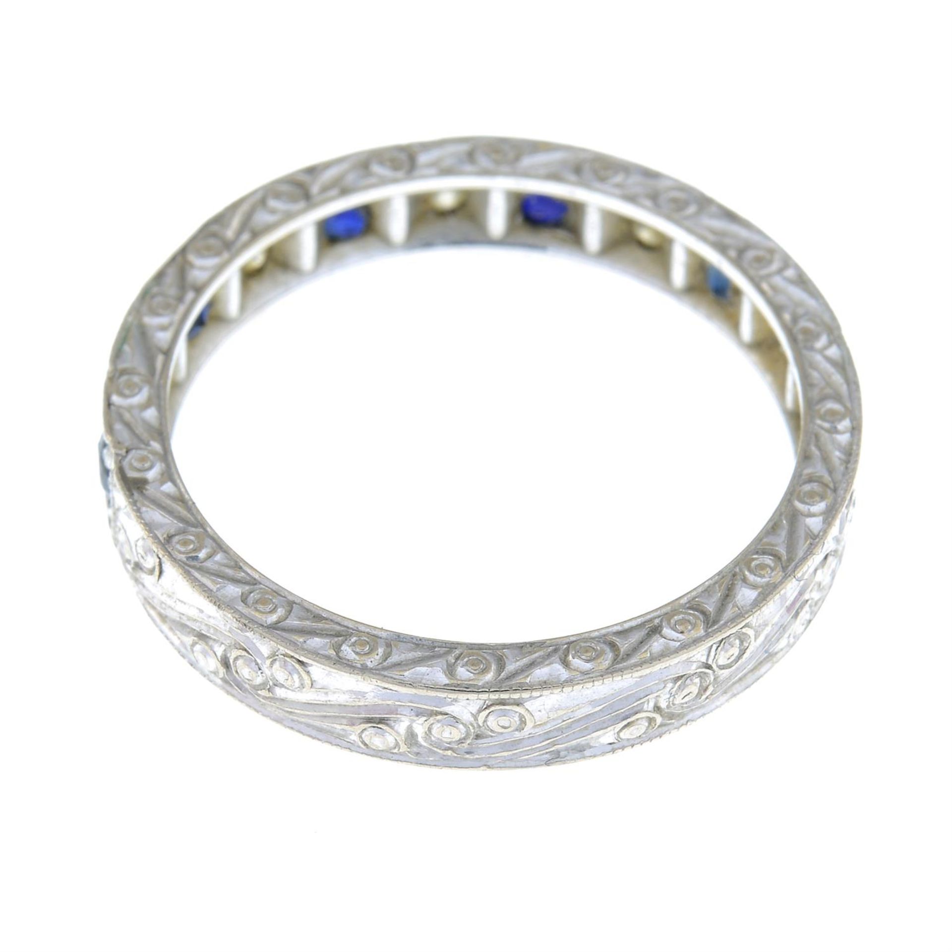 A diamond and sapphire half eternity ring. - Image 2 of 2
