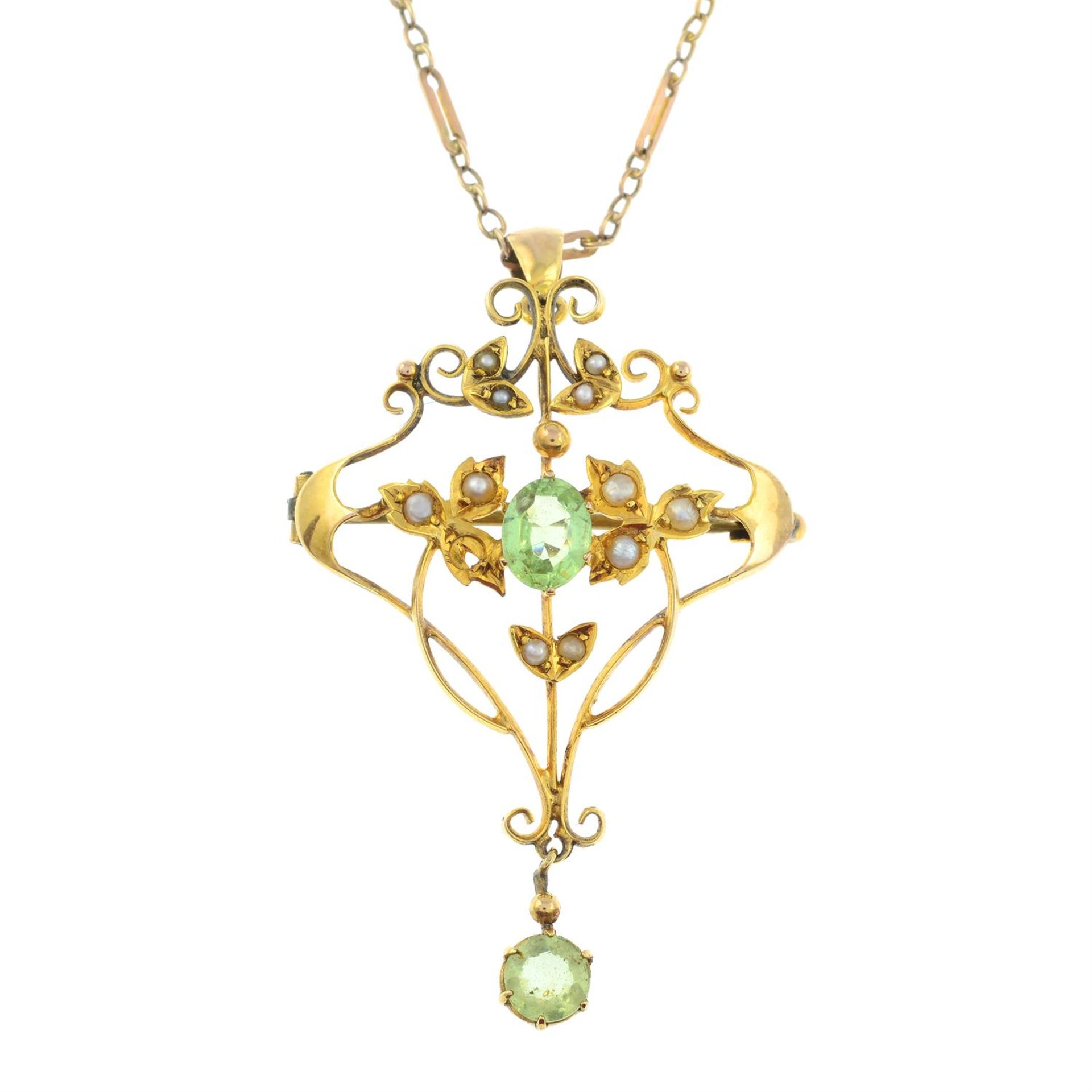 An early 20th century green paste and split pearl pendant, with fancy-link chain.