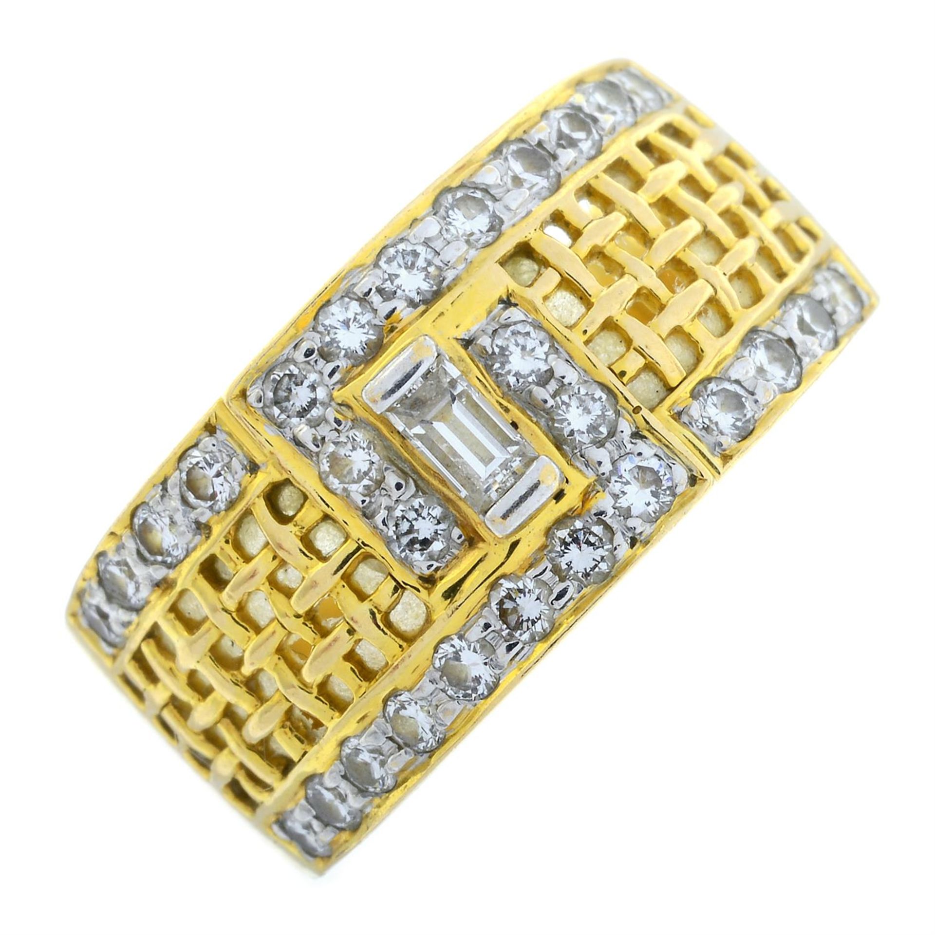 A baguette and brilliant-cut diamond openwork ring.