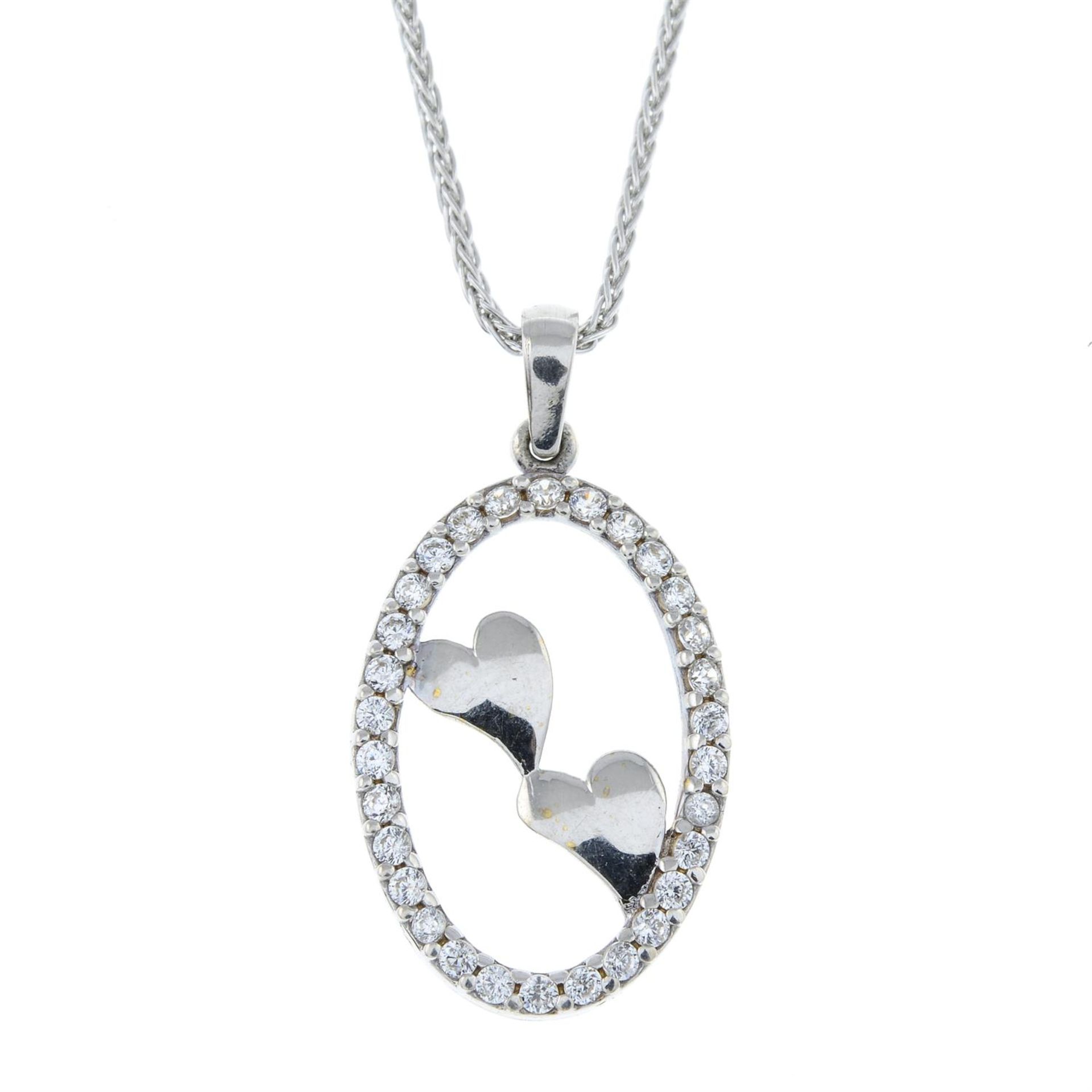 An 18ct gold cubic zirconia pendant, with 18ct gold chain.