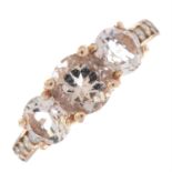 A morganite and diamond dress ring.