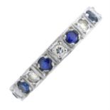 A diamond and sapphire half eternity ring.