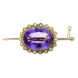 An early 20th century 9ct gold amethyst and split pearl bar brooch.