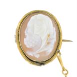 A shell cameo brooch, carved to depict a gentleman in profile.