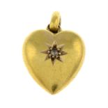 A late Victorian 15ct gold diamond accent heart pendant.