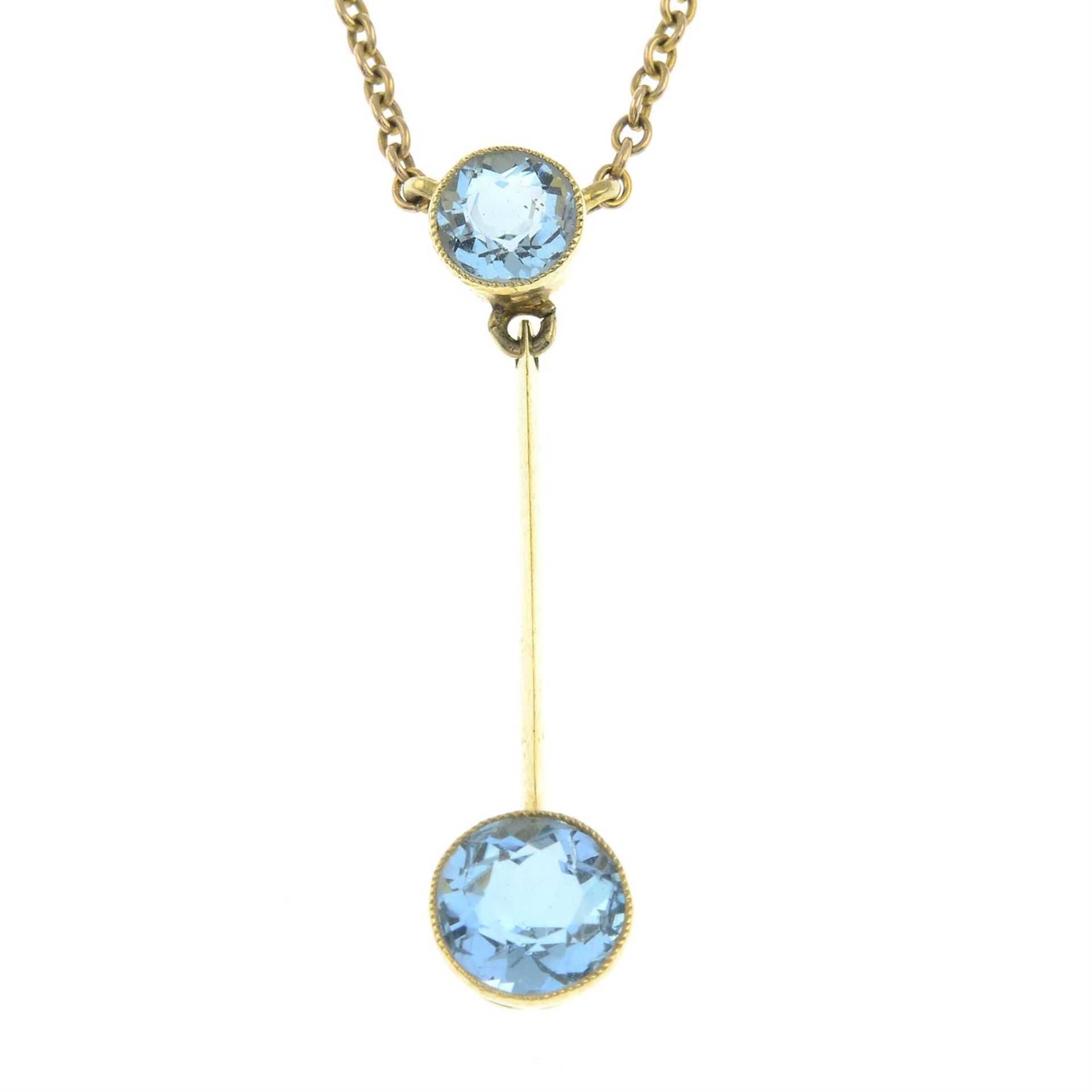 A aquamarine drop pendant, with integral chain.