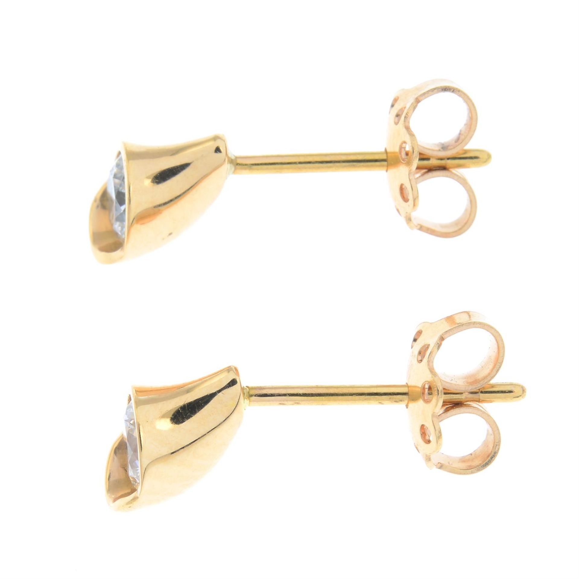 A pair of brilliant-cut diamond stud earrings. - Image 2 of 2