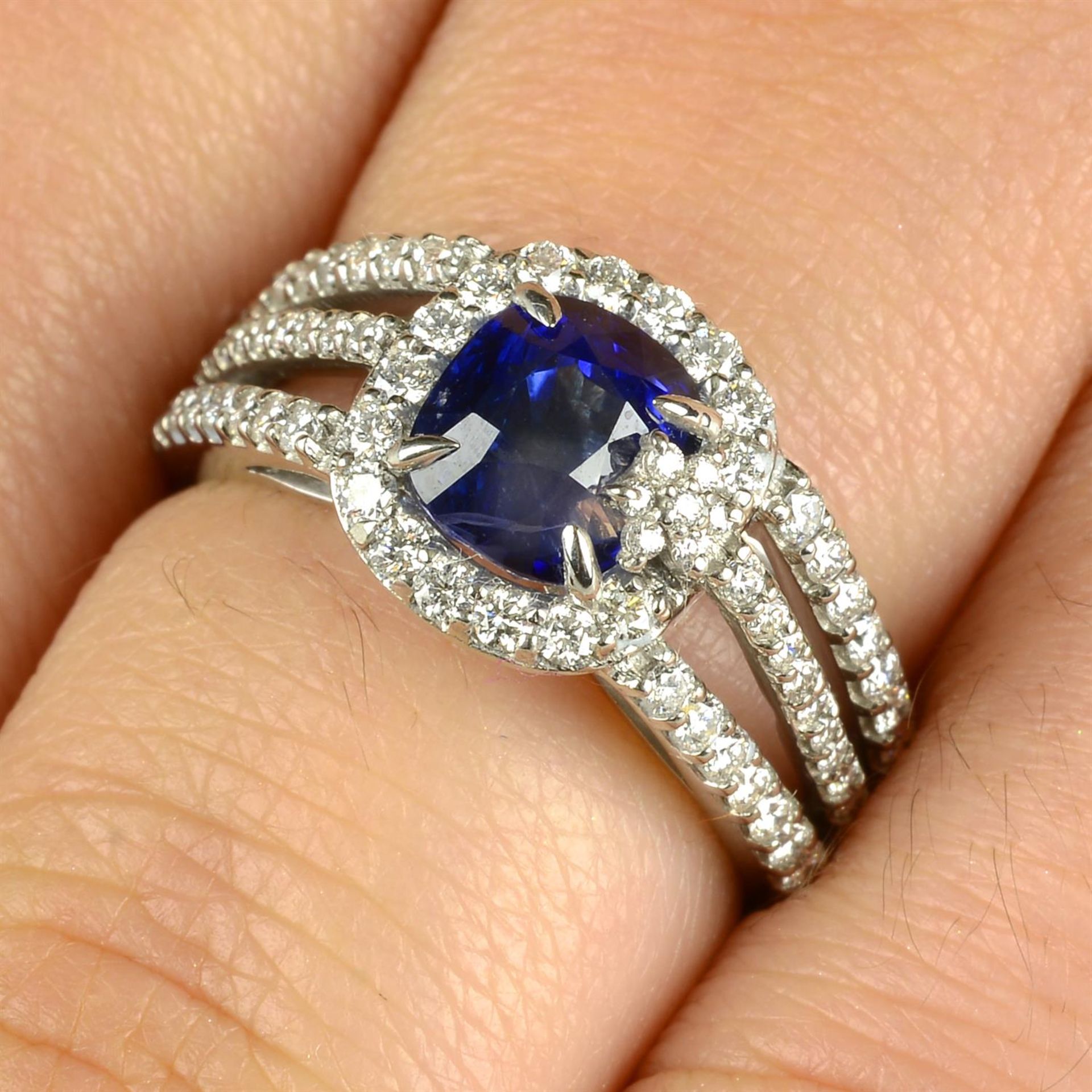A platinum sapphire and brilliant-cut diamond floral accent dress ring. - Image 5 of 6