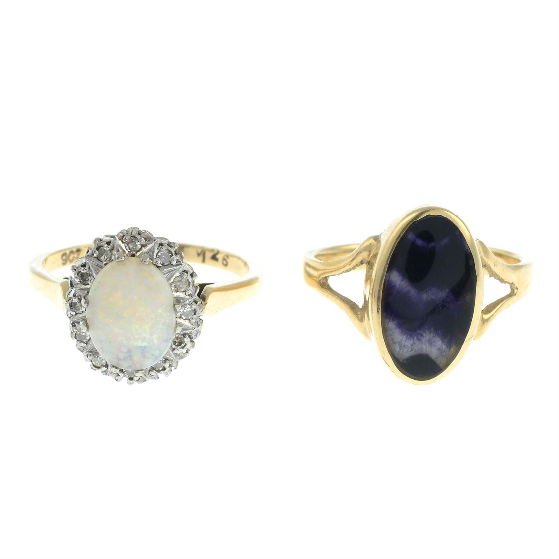An opal and diamond cluster ring, together with a flourite single-stone ring.