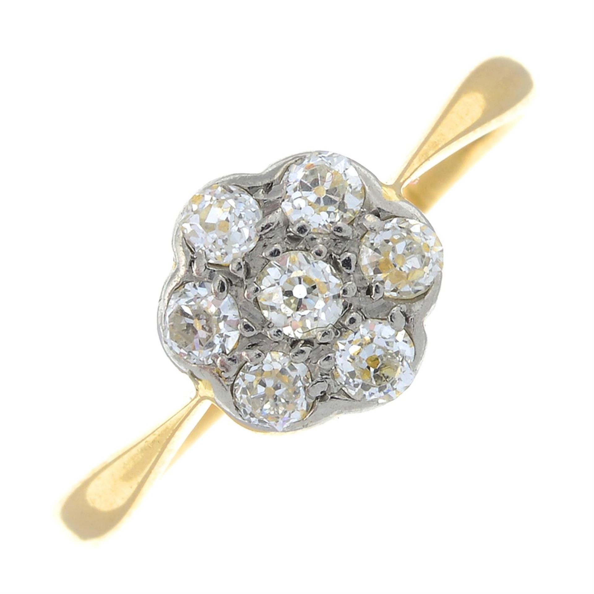 An 18ct gold old-cut diamond floral cluster ring.