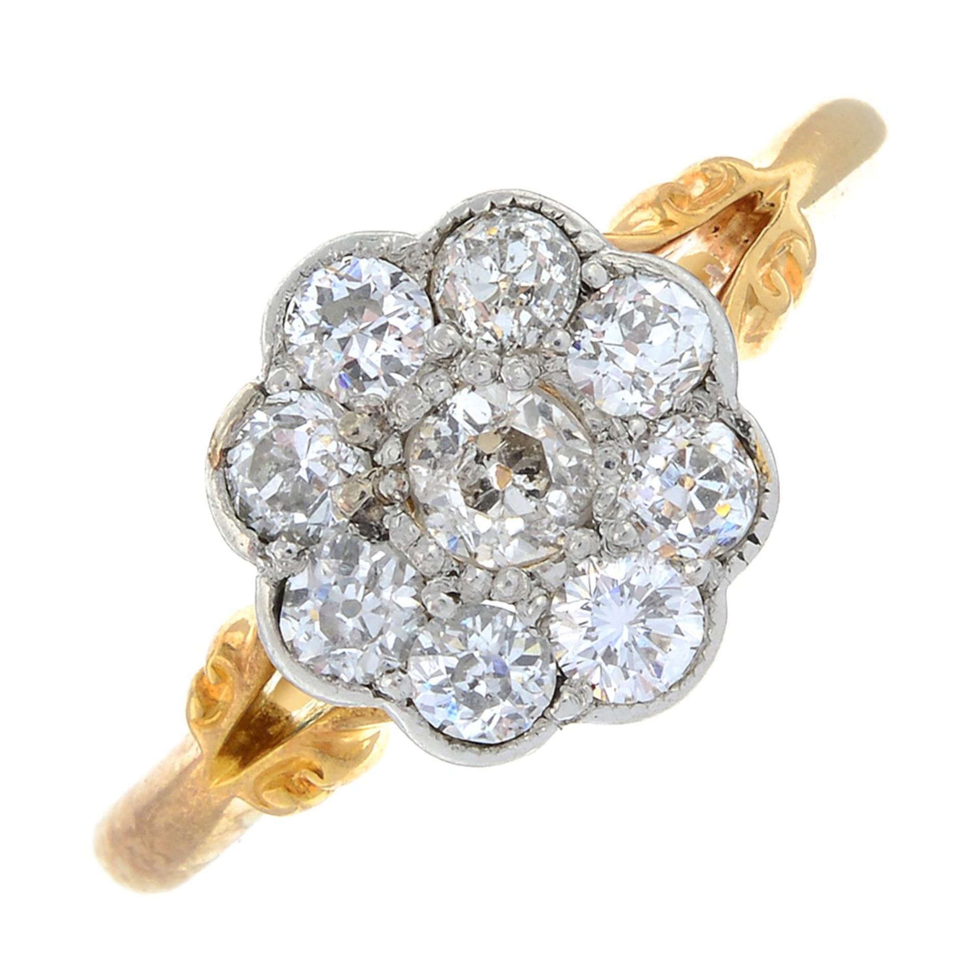 An old-cut diamond floral cluster ring.