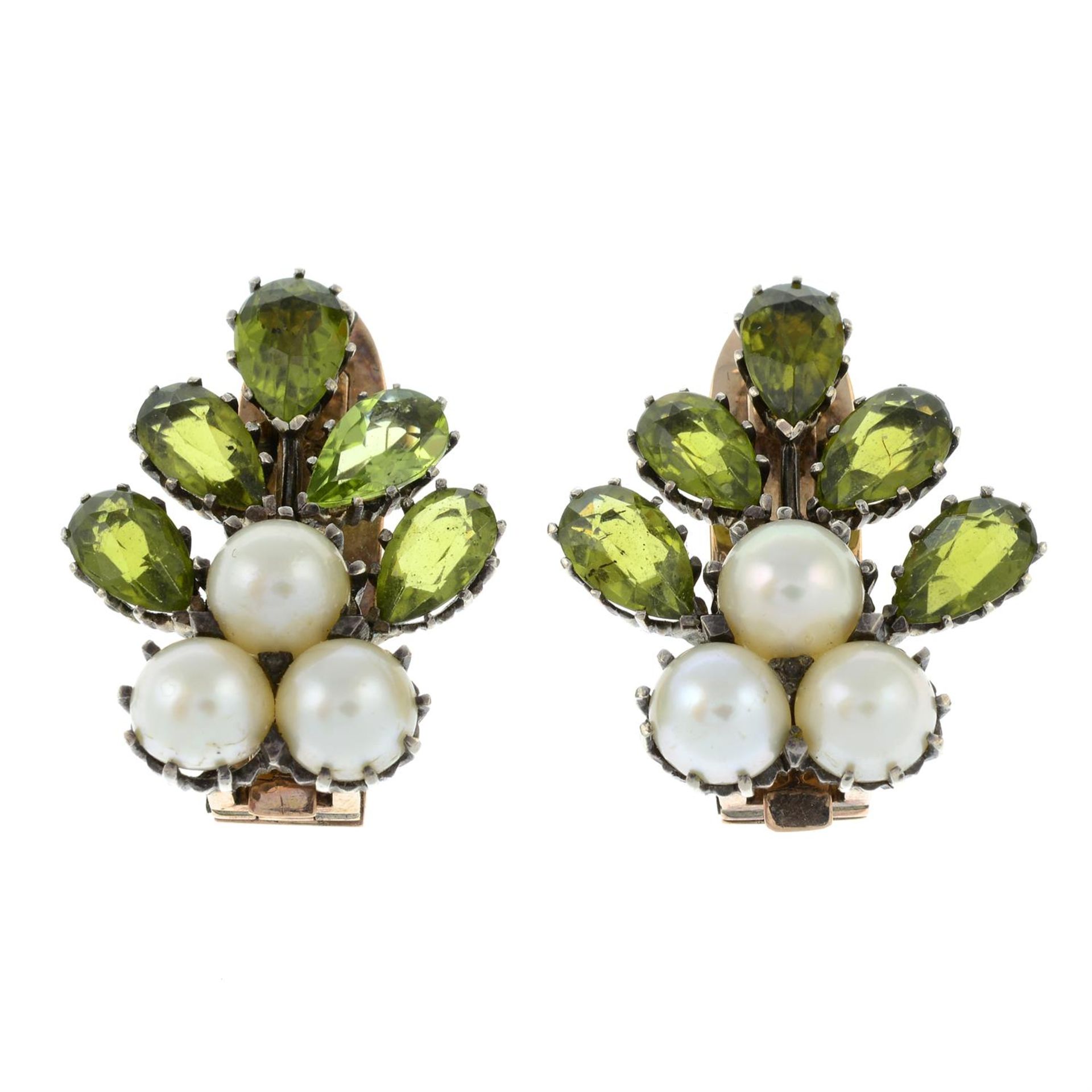 A pair of silver Arts and Crafts peridot and cultured pearl foliate clips, attributed to Dorrie