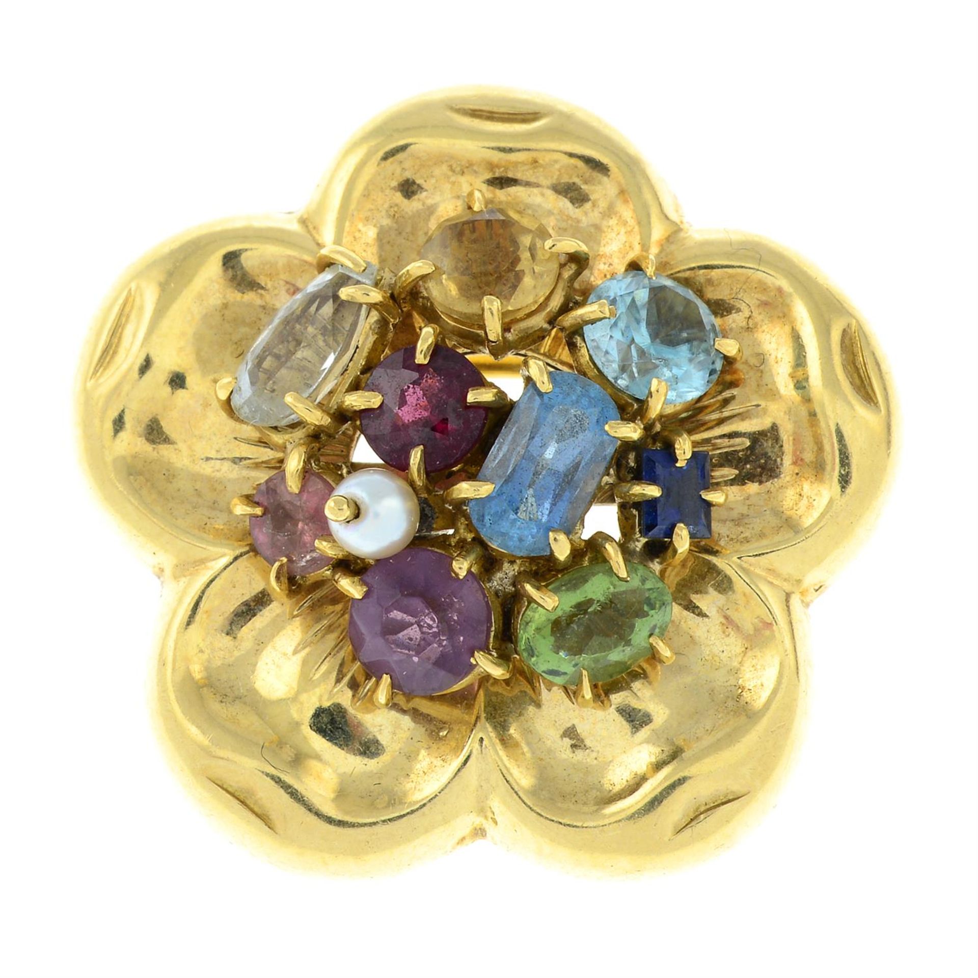 A multi-gem set floral brooch.