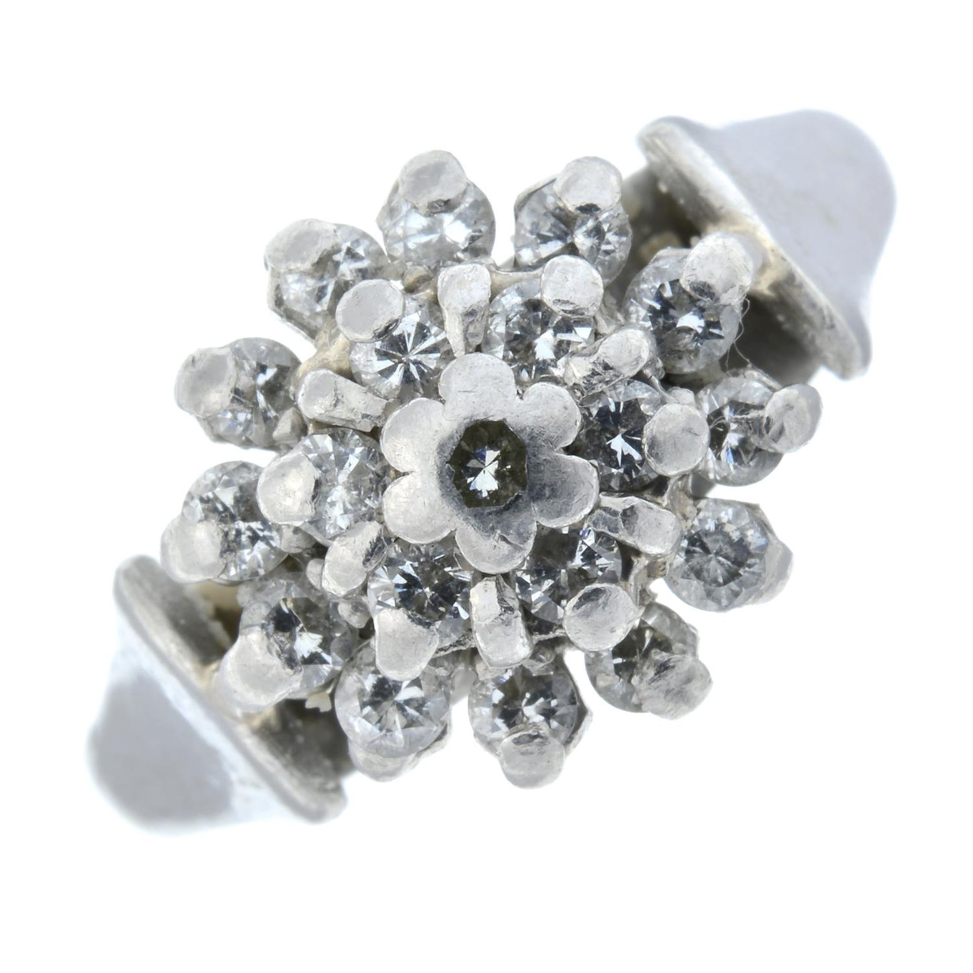 A platinum brilliant-cut diamond cluster ring.