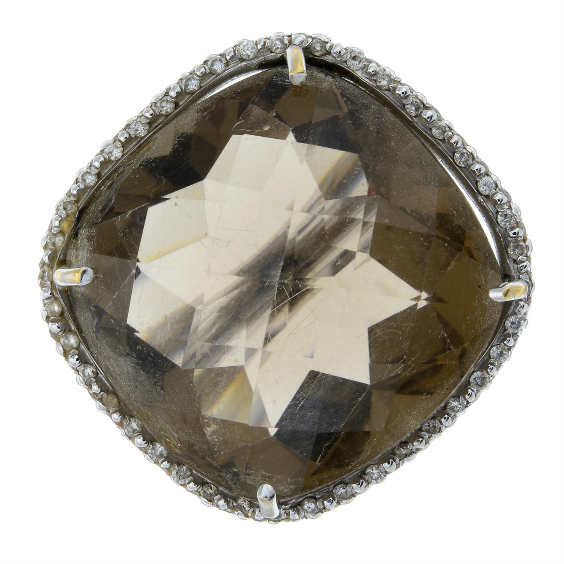 A smoky quartz and brilliant-cut diamond dress ring.