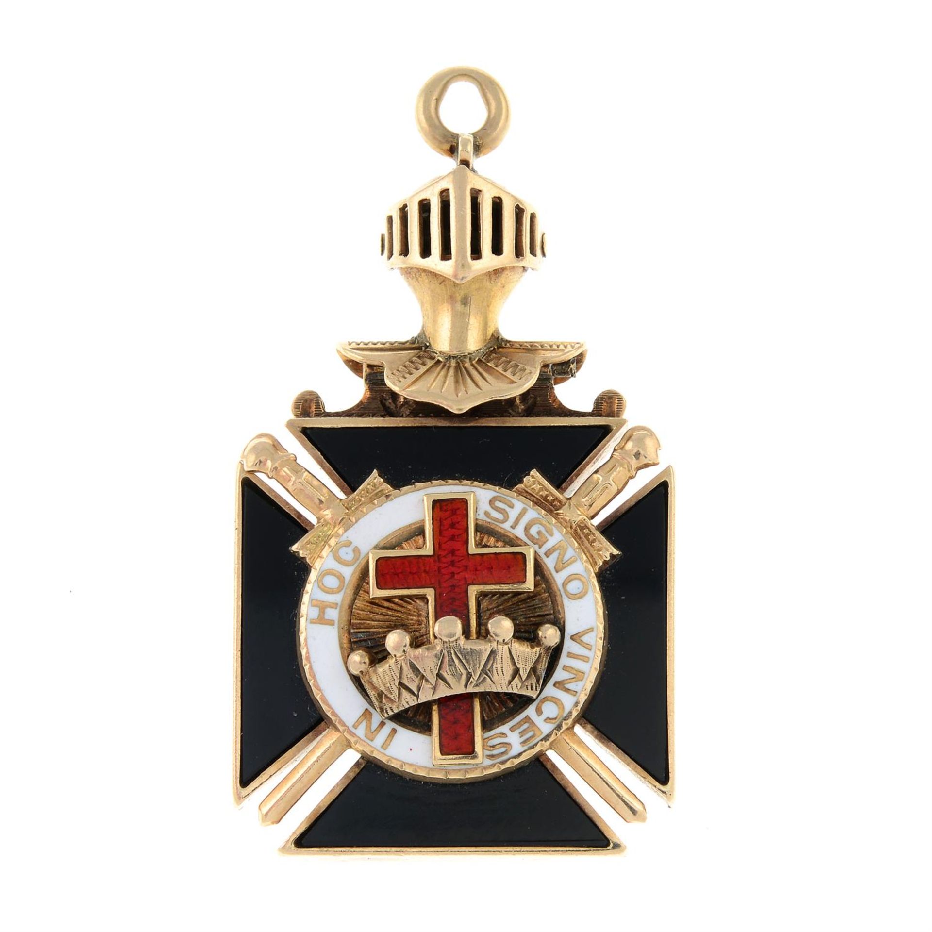 A masonic jewel, with red and black enamel detailing, and inscribed motto.