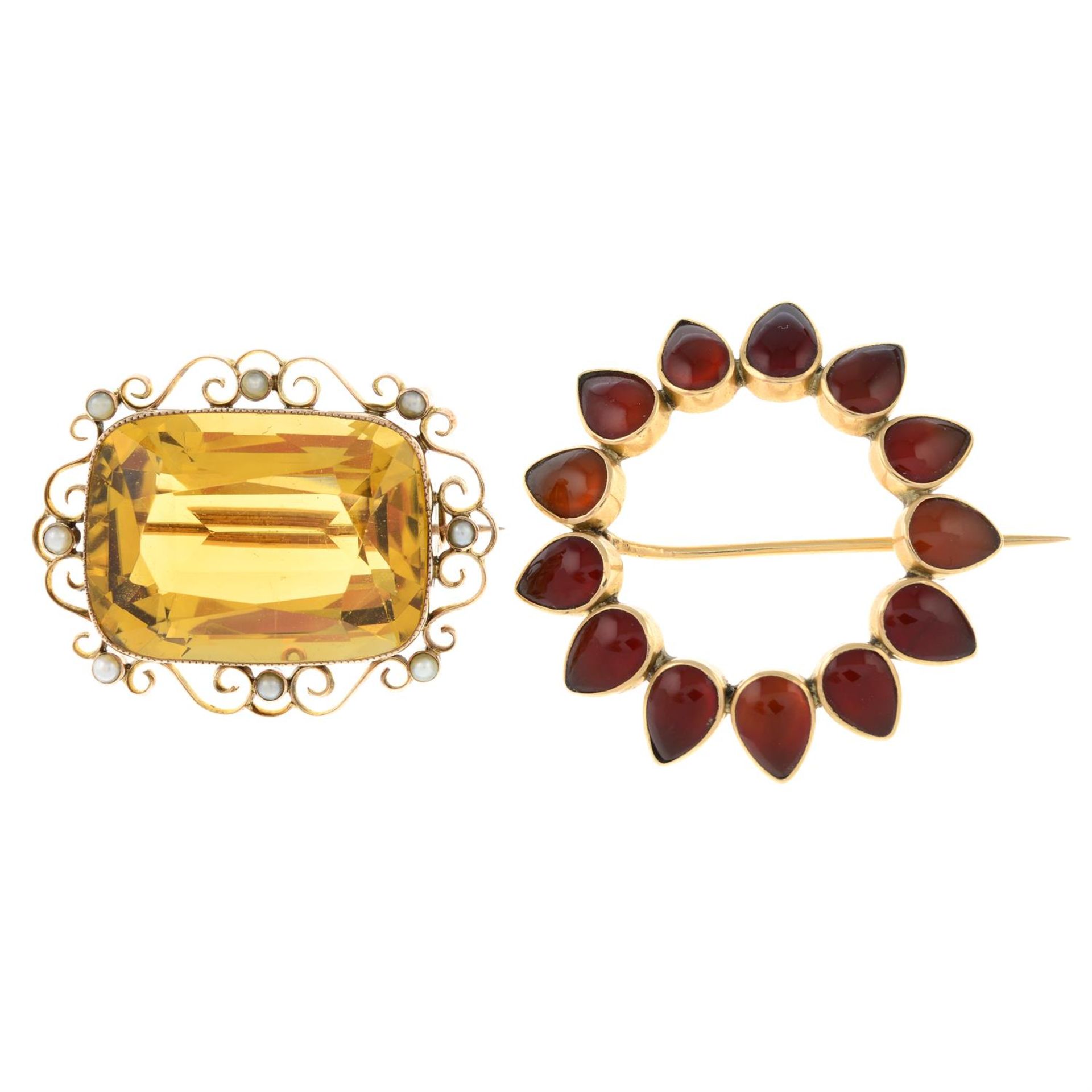An early 20th century 9ct gold citrine and split pearl brooch together with an early 20th century