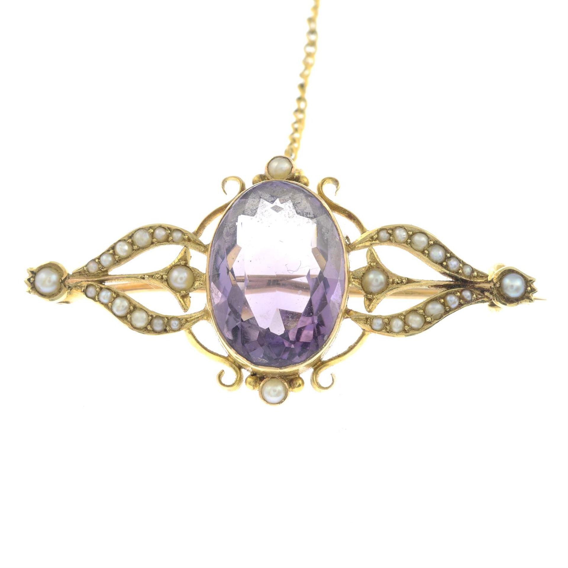 An early 20th century 15ct gold amethyst and seed pearl brooch.